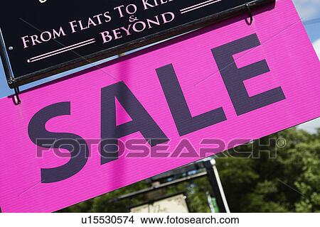 Picture - Close-up of an advertisement board, Adare, County Limerick, Republic of Ireland. Fotosearch