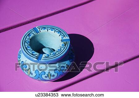 Stock Image - Close-up of an ashtray on a bench, Scheveningen, The Hague, Netherlands. Fotosearch