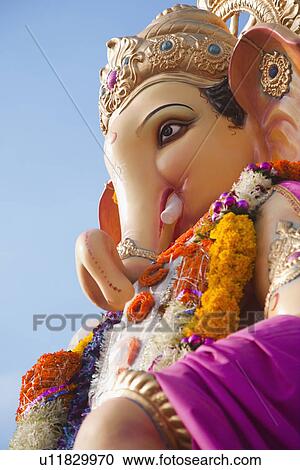 Close-up of an idol of Lord Ganesha, Mumbai, Maharashtra, India View Large Photo Image Stock Image - Close-up of an idol of Lord Ganesha, Mumbai, Maharashtra, India. Fotosearch