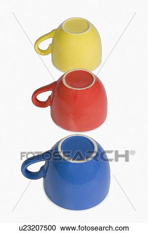 Stock Image - Close-up of colorful tea cups in a row. Fotosearch