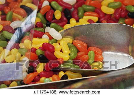 Close-up of multi-colored jellybeans at a market stall View Large Photo Image Stock Photo - Close-up of multi-colored jellybeans at a market stall. Fotosearch