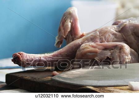 Stock Image - Close-up of raw chicken. Fotosearch