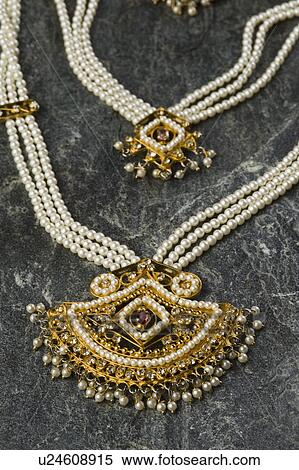 Stock Photography - Close-up of two necklaces. Fotosearch