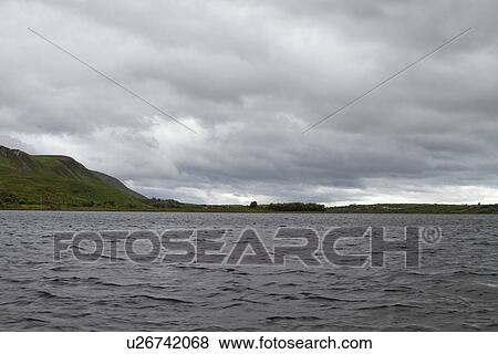 Stock Photo - Clouds over a lake, Lakes of Killarney, County Kerry, Republic of Ireland. Fotosearch