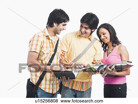 Stock Photo - College students reading books. Fotosearch
