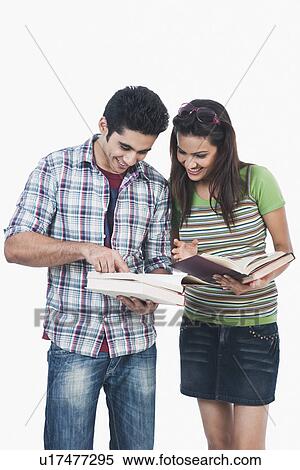 Stock Photography - College students reading books. Fotosearch