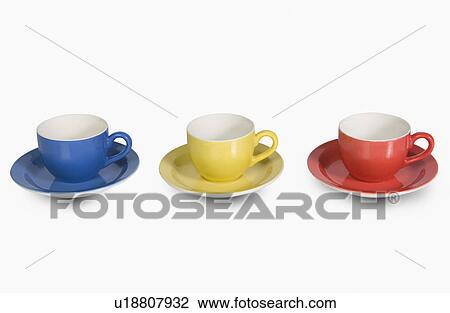 Colorful tea cups with saucers in a row View Large Photo Image Stock Image - Colorful tea cups with saucers in a row. Fotosearch