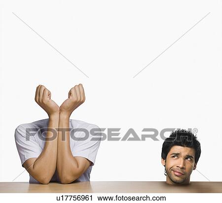 Composite image of a headless man with his head placed on a table View Large Photo Image Stock Image - Composite image of a headless man with his head placed on a table. Fotosearch