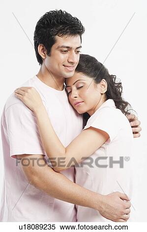 Stock Photography - Couple embracing each other. Fotosearch