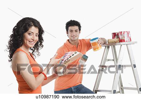 Couple renovating their house View Large Photo Image Stock Image - Couple renovating their house. Fotosearch