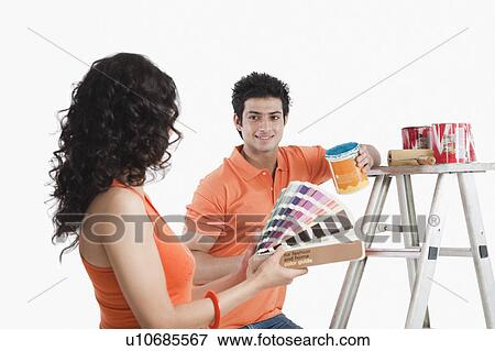 Couple renovating their house View Large Photo Image Stock Photo - Couple renovating their house. Fotosearch