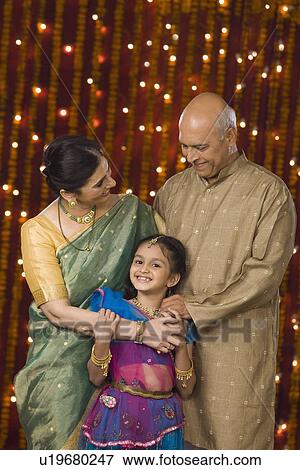 Stock Photo - Couple with granddaughter. Fotosearch