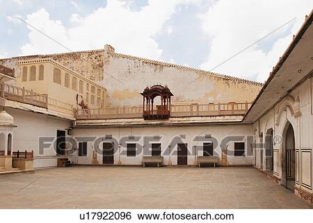 Stock Photograph - Courtyard of a palace, Hawa Mahal, Jaipur, Rajasthan, India. Fotosearch