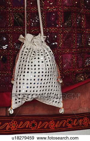 Stock Photo - Craft product for sale at a market stall, New Delhi, India. Fotosearch