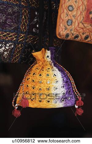 Stock Image - Craft products for sale at a market stall, New Delhi, India. Fotosearch