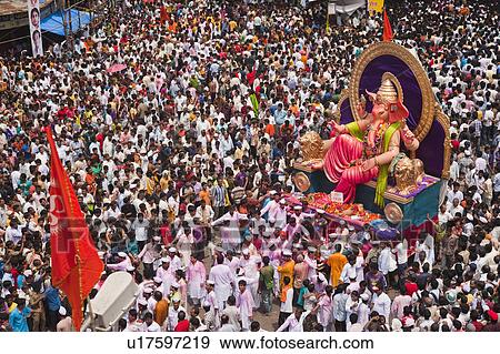 Stock Photo - Crowd at religious procession during Ganpati visarjan ceremony, Mumbai, Maharashtra, India. Fotosearch