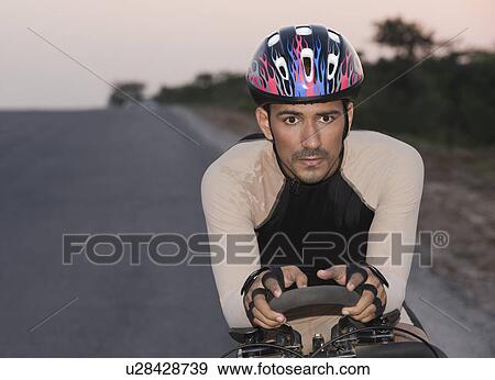 Stock Photo - Cyclist on a racing bicycle. Fotosearch