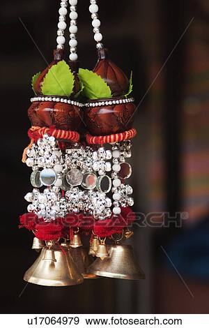 Stock Photo - Decorative craft products for sale at a market stall, New Delhi, India. Fotosearch