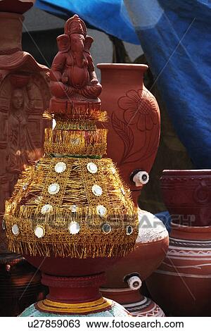 Stock Image - Decorative pots at a market stall, Delhi, India. Fotosearch