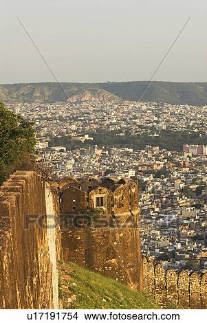 Picture - Defensive wall of a fort with cityscape, Nahargarh Fort, Jaipur, Rajasthan, India. Fotosearch
