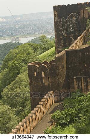 Defensive wall of a fort with cityscape, Jaigarh Fort, Jaipur, Rajasthan, India View Large Photo Image Stock Photo - Defensive wall of a fort with cityscape, Jaigarh Fort, Jaipur, Rajasthan, India. Fotosearch