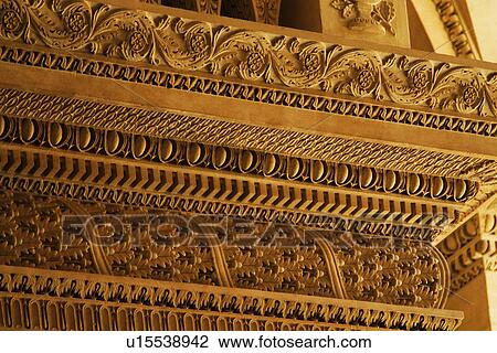 Stock Image - Details of carvings in a museum, Musee du Louvre, Paris, France. Fotosearch
