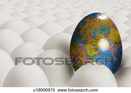 Stock Photography - Egg with image of earth among plain white eggs. Fotosearch