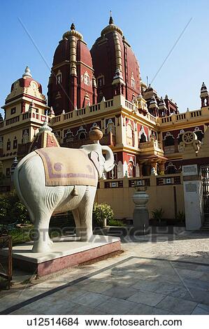 Picture - Elephant statue outside a temple, Lakshmi Narayan Temple, New Delhi, India. Fotosearch