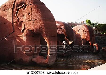 Stock Photo - Elephant statues in a garden, Garden of Five Senses, Saidul Ajaib, New Delhi, India. Fotosearch