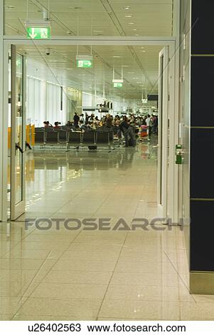Stock Image - Entrance of an airport lounge, Paris, France. Fotosearch