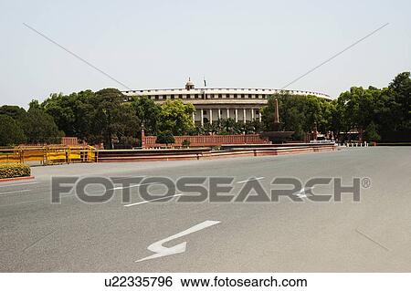 Stock Photograph - Facade of a government building, Sansad Bhavan, New Delhi, India. Fotosearch