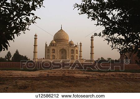Stock Image - Facade of a mausoleum, Taj Mahal, Agra, Uttar Pradesh, India. Fotosearch