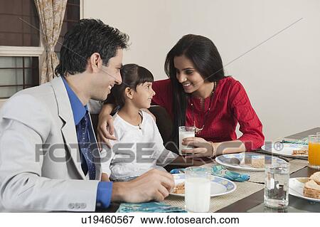 Family at a breakfast table View Large Photo Image Stock Photo - Family at a breakfast table. Fotosearch