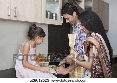 Family in the kitchen View Large Photo Image Stock Image - Family in the kitchen. Fotosearch