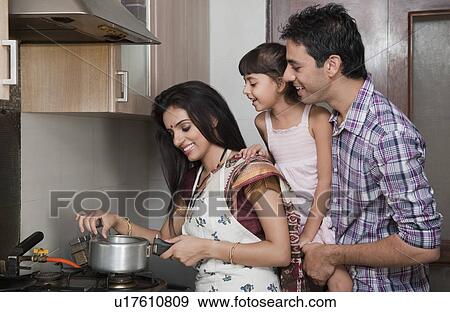 Family in the kitchen View Large Photo Image Stock Photo - Family in the kitchen. Fotosearch