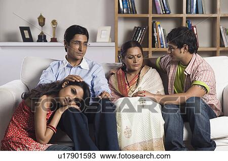Family looking sad View Large Photo Image Stock Image - Family looking sad. Fotosearch