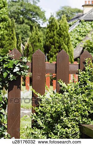 Stock Image - Fence of a restaurant, Adare, County Limerick, Republic of Ireland. Fotosearch