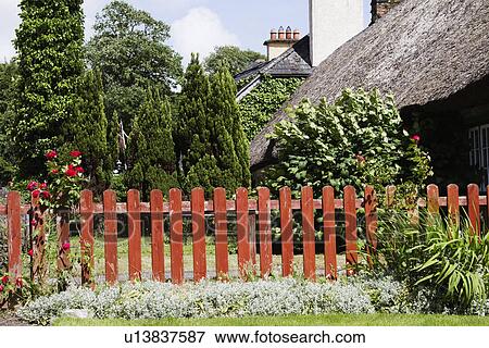 Stock Photo - Fence of a restaurant, Adare, County Limerick, Republic of Ireland. Fotosearch