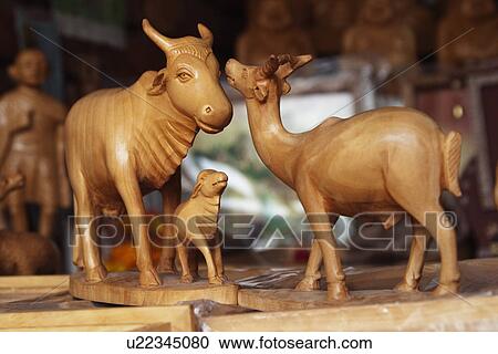 Figurines of animals at a market stall, New Delhi, India View Large Photo Image Stock Image - Figurines of animals at a market stall, New Delhi, India. Fotosearch