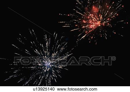 Fireworks display at night View Large Photo Image Stock Image - Fireworks display at night. Fotosearch