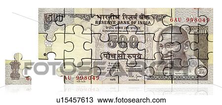 Stock Image - Five hundred Indian rupee note made of jigsaw piece. Fotosearch