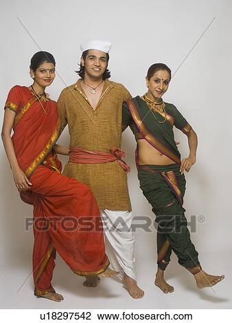 Folk dancer dancing together in traditional Maharashtrian dress View Large Photo Image Stock Image - Folk dancer dancing together in traditional Maharashtrian dress. Fotosearch