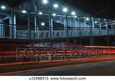 Footbridge lit up at night, National Highway 8, Gurgaon, Haryana, India View Large Photo Image Stock Image - Footbridge lit up at night, National Highway 8, Gurgaon, Haryana, India. Fotosearch