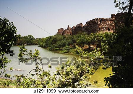 Fort at lakeside, Old Fort, Delhi, India View Large Photo Image Stock Photo - Fort at lakeside, Old Fort, Delhi, India. Fotosearch