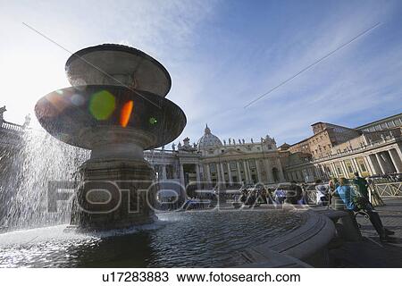 Stock Image - Fountain at St. Peters Square, Vatican City. Fotosearch