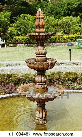 Stock Photo - Fountain in a park, Jim Corbett National Park, Nainital, Uttarakhand, India. Fotosearch