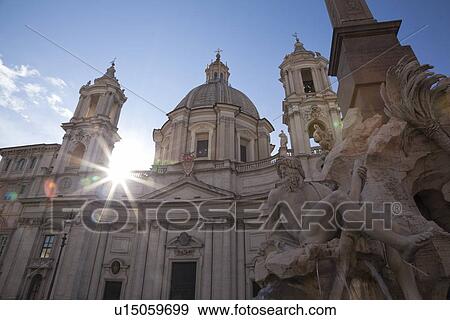Fountain of the four Rivers with obelisk, church of SantAgnese in Agone, Piazza Navona, Rome, Lazio, Italy View Large Photo Image Stock Photo - Fountain of the four Rivers with obelisk, church of SantAgnese in Agone, Piazza Navona, Rome, Lazio, Italy. Fotosearch