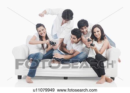 Stock Photo - Friends playing video game. Fotosearch