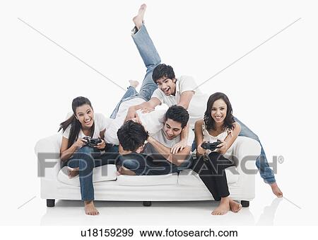 Stock Photo - Friends playing video game. Fotosearch