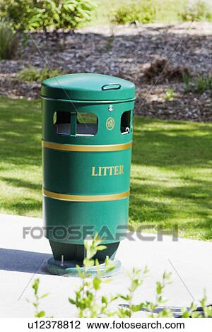 Stock Image - Garbage bin in a park, Adare, County Limerick, Republic of Ireland. Fotosearch